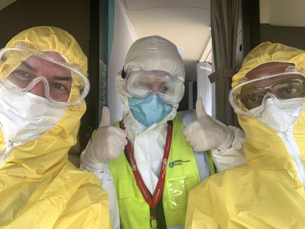 Universal Launches COVID-19 Standards Program for Preferred Suppliers across its 100 Top Destinations. smiling aviation workers