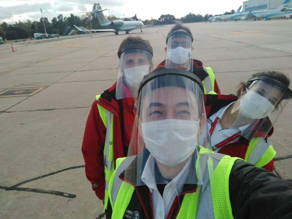smiling aviation workers in COVID-19