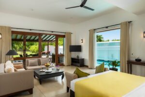 Luxurious Aditya Resort pool villa, showcasing a breathtaking poolside vista.